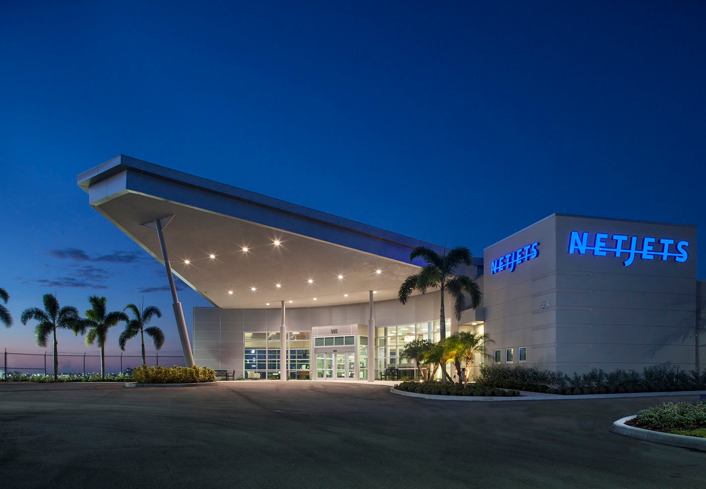 NetJets aviation facility at dusk