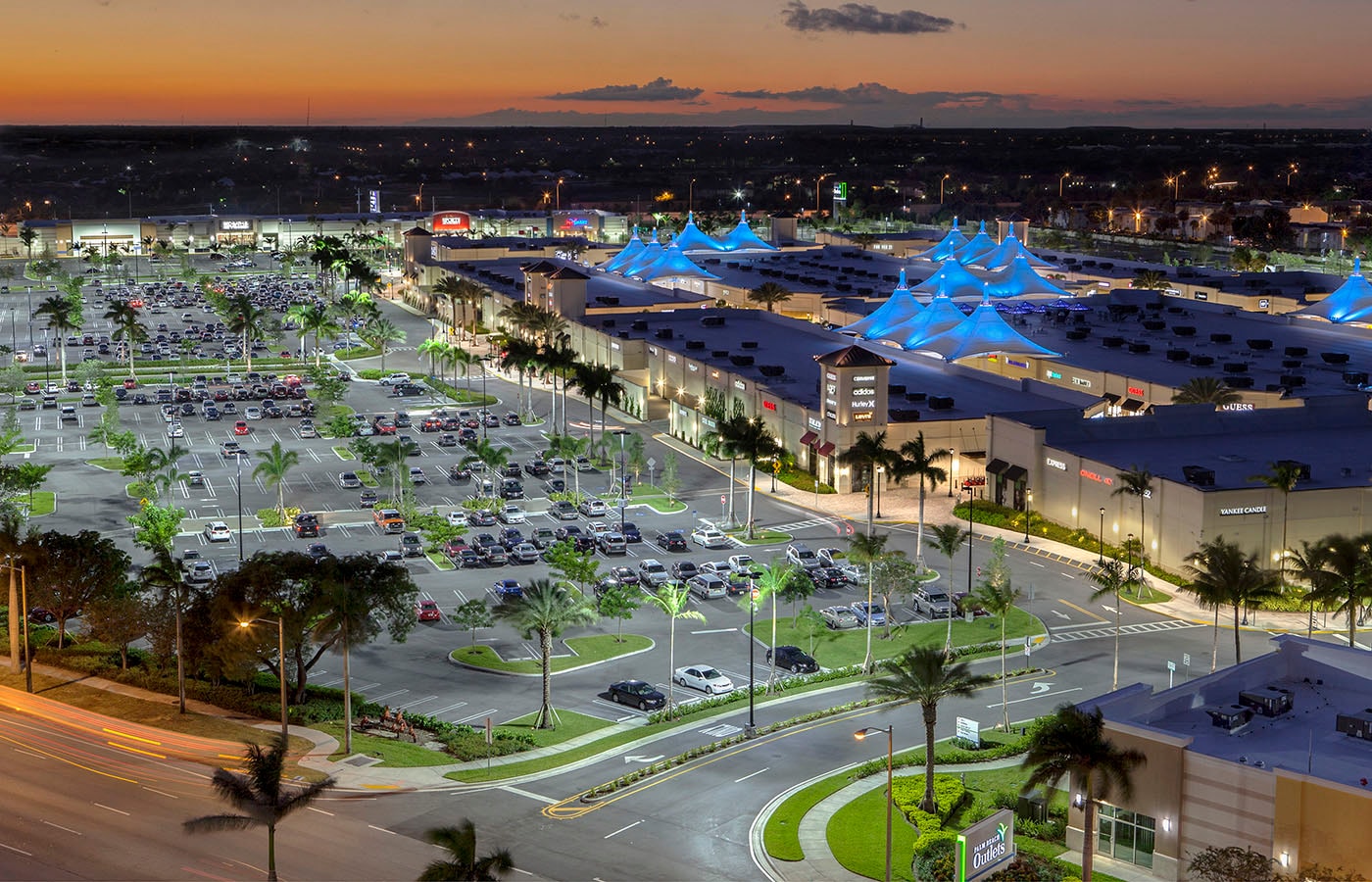 Aerial view of Palm Beach Outlets at dusk